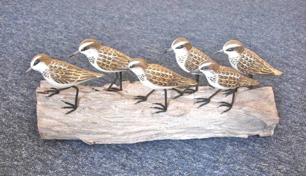 - a Sculpture by Wooden Birds, measuring 20 x 48 cm (H x W) £148